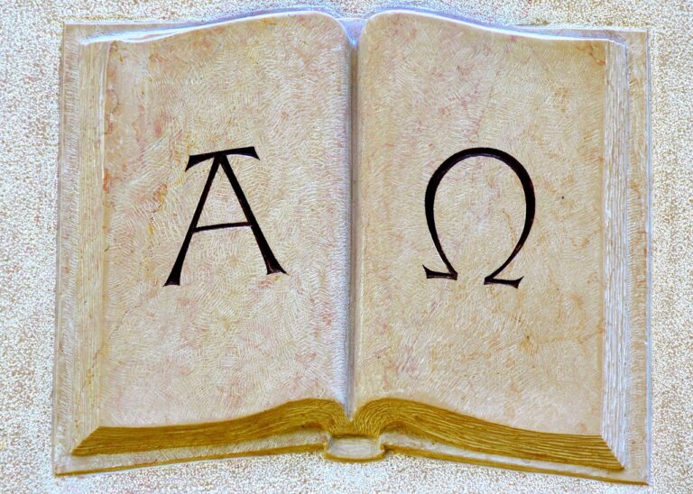 Open book with Alpha and Omega symbols, symbolizing Revelation 22:13 - Jesus as the beginning and the end.